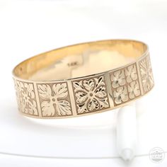 Hawaiian bangles engraved with traditional Hawaiian quilt design. Handmade with 14K gold. Bangle width is 18mm. LOVIN' HAWAII JEWELRY FEATURES Made to Order. Handmade in Hawaii. Hand engraved design. Gold Karat: 14 Karat Available Gold Color: Rose Gold / Yellow Gold / White Gold Ready to Ship in 5 Business Days from HAWAII. Free inside message engraving. To make the piece more personal, you can add a special message on the inside of the ring. Inside inscription on traditional Hawaiian Heirloom J Luxury 14k Gold Etched Jewelry, Elegant Etched Yellow Gold Cuff Bracelet, Elegant Etched Yellow Gold Bangle, Engraved Yellow Gold Bangle, Etched Yellow Gold Bracelet For Ceremonial Occasions, Luxury Engraved Bangle For Ceremonial Occasions, Etched Yellow Gold Bracelet, Luxury Etched Yellow Gold Jewelry, Traditional Yellow Gold Jewelry With Decorative Band