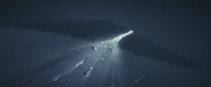 an underwater view of the ocean with light coming from it