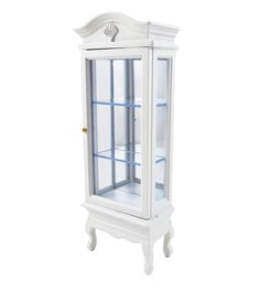 a white display cabinet with glass doors