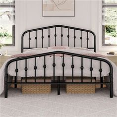 a black metal bed frame with wicker baskets under the headboard and foot board