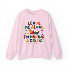 Are you having a crisis and just want to be left alone? Well then this Im Having A Crisis Sweatshirt is for you! This kidcore crewneck pullover sweatshirt that says Leave Me Alone Im Having A Crisis is a funny sweatshirt to wear for when you just want to be a colorful worm instead of dealing with the world. Inspired by the colorful aesthetic of kidcore clothing - this kidcore sweatshirt surely is a comfy sweatshirt that will get you everyone to have a second look at what your sweatshirt says. This can also be a funny gift for her, funny gift for him or anyone in between who just wants to be a worm as this cute sweatshirt is unisex. Available in Small, Medium, Large, XL, 2XL, 3XL, 4XL and 5XL ✨ 50% cotton, 50% polyester ✨ Medium-heavy fabric ✨ Loose fit ✨ Sewn-in label ✨ Runs true to size ✨ Kidcore Sweater, Pastel Kidcore Outfits, Kidcore Style, Kid Core Outfits, Kidcore Clothes, Kidcore Fashion, Kidcore Clothing, Y2k Shirts, Silly Shirt