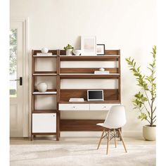 a white chair sitting in front of a wooden shelf filled with bookshelves and drawers