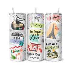 three travel mugs with different designs and words on the sides, one is white