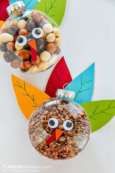 an ornament shaped like a turkey with nuts in it