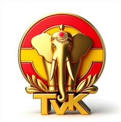 an elephant is standing in front of a red and yellow circle with the letter tk on it