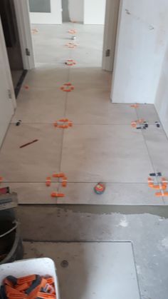 there are many orange pieces on the floor