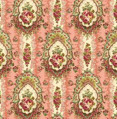 a pink and green floral wallpaper with an ornate design on the bottom half of it