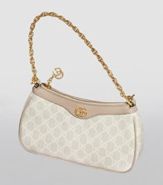 Characterised by the GG-coated canvas, this shoulder bag is the latest addition to Gucci’s beloved Ophidia collection, defined by its crescent-inspired form and smooth curves. Made in the brand’s native Italy, it has an adjustable strap for versatile styling and an interior slip pocket, meaning you won’t need to save space for a wallet. Aesthetic Purse, Gucci Ophidia Bag, Small Purses And Handbags, Sling Bags Women, Gucci Purses, Gucci Purse, Luxury Bags Collection, Gucci Ophidia, Latest Bags