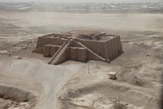 an aerial view of a building in the desert