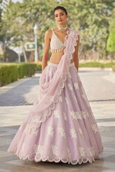 Powder lilac attached cancan scallop hem lehenga hand embroidered with floral applique work. Paired with a tassel, pearl embellished padded blouse. Comes with an embroidered scallop hem dupatta. - Aza Fashions Flower Lehenga, Lilac Lehenga, Pearl Blouse, Vani Vats, Purple Lehenga, Organza Lehenga, Indian Outfits Lehenga, Lehenga Designs Simple, Organza Blouse