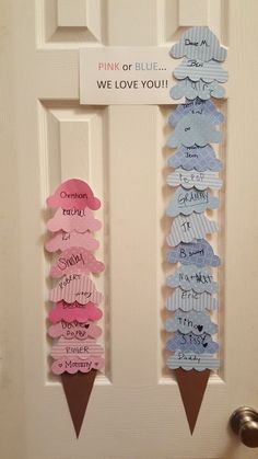 the door is decorated with pink and blue paper