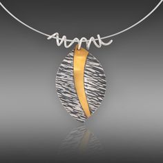 Gold & Silver Necklace - The simple leaf form is enhanced with 24k gold. This piece is made from sterling silver to which 24k gold is applied using the keum-bo process. The silver is textured, oxidized and selectively polished to create a striking tri-color pendant. The pendant measures approximately 1.75 inches long by 1.25 inch wide. A sterling silver tendril bail attaches the pendant to your choice of a 16 inch or 18 inch sterling silver omega chain neck wire. Keumboo Jewelry, Elm Leaf, Surface Embellishment, Keum Boo Jewelry, Rivet Jewelry, Cage Ring, Gold Silver Necklace, Wire Wrapped Jewelry Pendant, Keum Boo