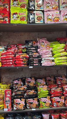 several shelves filled with different types of snacks