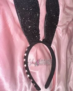 "Once you put on your Crystal Bling Customized Rhinestone Bunny Ears Headband your bunny outfit will be instantly glamorous! Each ear is blinged on one side with beautiful sparkly hand placed black crystals. The hand and piece itself is blinged with black and crystal clear stones. The wire inside the rabbit ear makes it bend freely and movable. The ears itself is 8.2\" long and 3.5\" wide." Glamorous Party Headband, Party Headband With Rhinestones, Adjustable Cat Ears Headband For Parties, Bunny Ears Headband Aesthetic, Bunny Ears Headband Black, Clip On Bunny Ears, Silver Crystal Embellished Headband For Party, Rhinestone Mickey Ears, Lace Bunny Ears