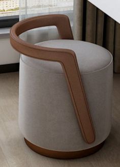 an unusual looking chair in front of a window