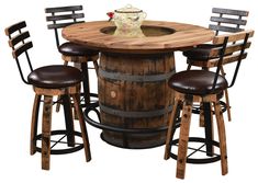 a wooden table with four stools around it and a wine barrel as the centerpiece