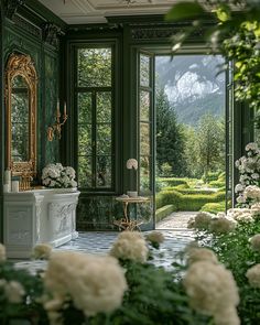 a room with green walls and white flowers in the foreground