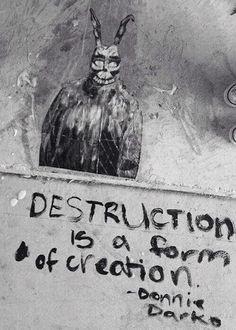 graffiti on the side of a building that says destruction is a form of creation