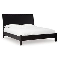 a bed with white sheets and black headboard on it's side, in front of a white background