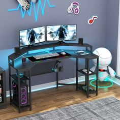 a computer desk with two monitors on it