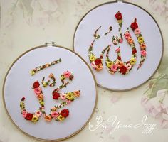 two embroidery hoops with flowers and the word sale spelled out