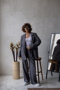 Step into modern sophistication with our Women's Gray Oversize Suit Set. This meticulously designed ensemble effortlessly blends comfort and style. Elevate your look with our versatile Two Piece Suit Set, featuring a tailored blazer and coordinating pants that transition seamlessly from professional to chic casual. Make a statement with our Women's Blazer and Suits, exuding confidence and elegance. Embrace the trend with our Oversize Blazer For Women's, offering contemporary style without compro Women Oversized Suit Outfits, Blazer And Tracksuit Outfit, Unisex Suits For Women, Braids And Suit Women, Suits For Women Oversize, Tuxedo Outfits For Women, Curvy Women Suits, Masculine Dress For Women, Oversize Suit Women