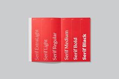 two red book covers with white lettering on the front and back cover are folded in half