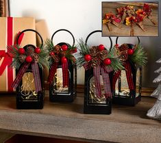 three christmas decorations are sitting on a mantle