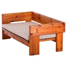 a wooden bed frame with a cushion on the top and bottom part in between two sides