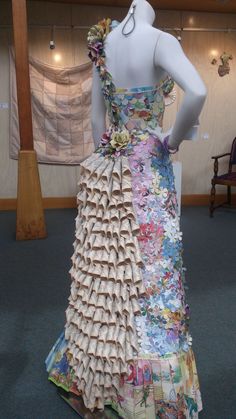 a dress made out of books is on display