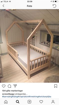 the bed frame is made out of wood