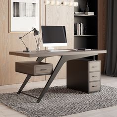 an office desk with a computer on it