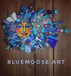 the cover of blue moose art's album, featuring an image of a woman's face