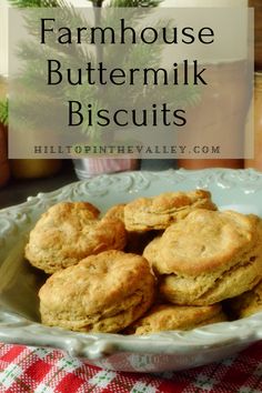 buttermilk biscuits on a plate with text overlay that reads farmhouse buttermilk biscuits