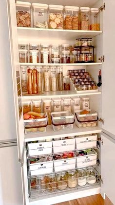 an organized pantry with lots of food in it