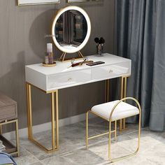 a dressing table with a mirror, stool and makeup brush on it in a room