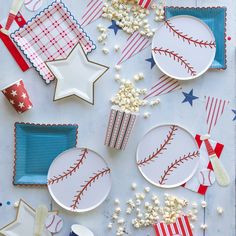 baseball themed plates and napkins on a table