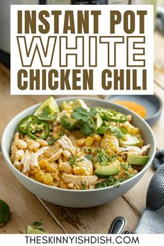 instant pot white chicken chili in a bowl with avocado and cilantro