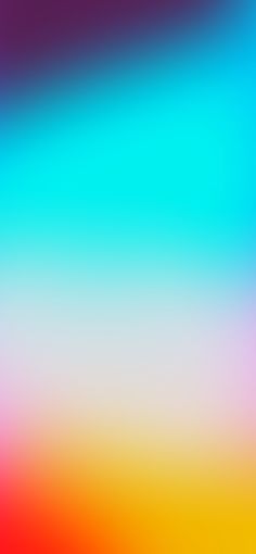 an abstract blurry background with red, yellow and blue colors