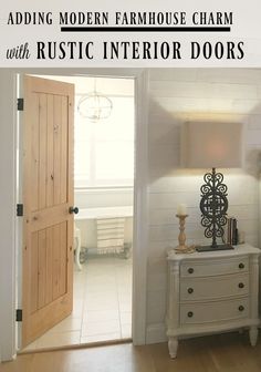 an open door leading to a bedroom with white walls and wood flooring, along with the words adding modern farmhouse charm with rustic interior doors