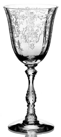 an empty wine glass is shown in black and white