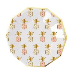 a paper plate with pineapples on it