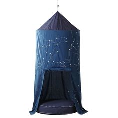 a blue tent with stars on it hanging from the ceiling and in front of a white background