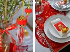 the table is decorated with red and gold decorations