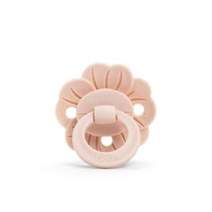 a pink pacifier with a flower on it