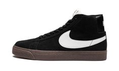 The Nike SB Zoom Blazer Mid “Black/Dark Gum” is a timeless colorway of the venerable skate shoe.  The Nike SB Zoom Blazer Mid is the alternate version of the retro basketball shoe that’s made for skateboarding.  On the “Black/Dark Gum,” the shoe features a black suede construction with a contrasting white leather Swoosh on the sides.  Classic “Nike” branding is embroidered on the back of the shoe.  “Nike SB Zoom Blazer Mid” detailing appears on the tongue tag.  Nike’s Zoom Air cushioning in embe Dark Gums, Nike Sb Zoom Blazer Mid, Nike Sb Zoom Blazer, Nike Sb Shoes, Retro Basketball Shoes, Nike Branding, Nike Sb Zoom, Retro Basketball, Shoe Nike