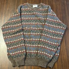 New Old Stock Men’s Large Tundra Pure Virgin Wool Sweater. This Warm Brown Sweater Has Blue, Green, Red And White Knitted Details. New Old Stock In Perfect Condition. Warm Brown, Brown Sweater, Wool Sweater, Wool Sweaters, Blue Brown, Red And White, Blue Green, Men Sweater, Conditioner