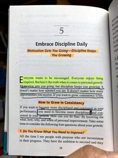 an open book with the title 5 embrace discipline daily written in orange and green on it