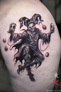 a black and white tattoo of a skeleton wearing a hat