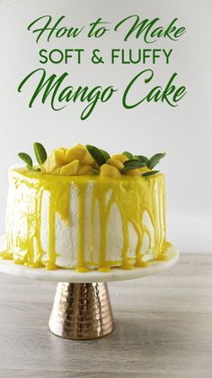 how to make soft and fluffy mango cake on a white cake stand with the words how to make soft and fluffy mango cake